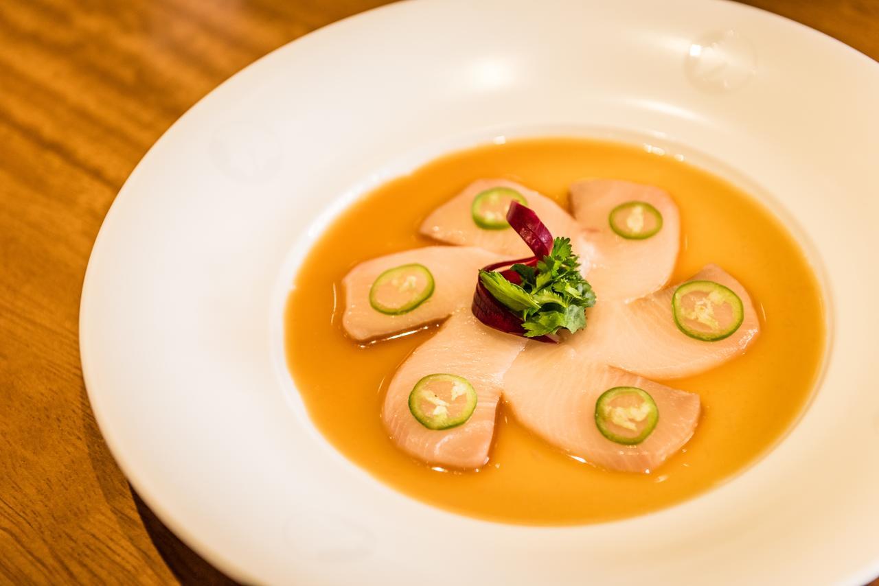 Nobu Hotel Marbella Esterno foto A plate of scallop sashimi